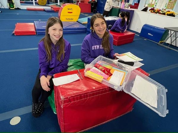 Gymnastics East athletes helping at the gym